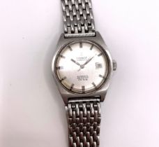 A gentleman's stainless steel Tissot automatic wristwatch, with silvered baton dial, date
