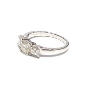 An 18ct white gold graduated princess-cut diamond 3-stone ring. Diamonds 1.51ct. Certificate