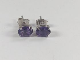 A pair of Amethyst studs in silver.