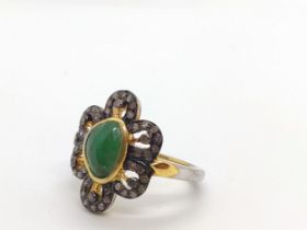 A silver gilt vintage-style ring set with emerald and diamonds. Mixed-cut emerald 1.58ct. Rose-cut