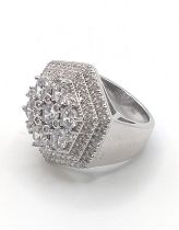 A large silver hexagonal gent's ring set with round cut white cubic zirconia. Size J 1/2
