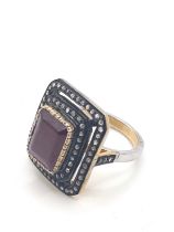 A large vintage style step-cut ruby and double diamond frame ring in silver gilt. Ruby 5.21ct.