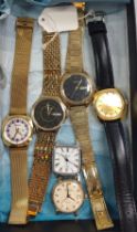 A collection of six watches including a vintage Garrard, a vintage Trafalgar, A Sekonda and three