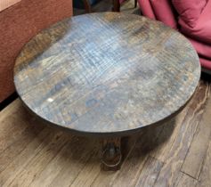 A large round oak coffee table. 40cm x 100cm diameter.