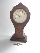 A French mantel clock with key