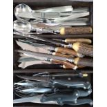 A canteen of cutlery including six steak knives and forks, three fish knives and forks, five diner
