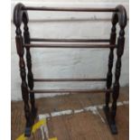 A wooden towel rail