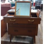 A teak mid-century compact dressing table (Brandon range)where the mirror folds away into the top