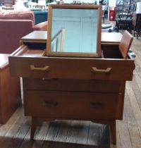 A teak mid-century compact dressing table (Brandon range)where the mirror folds away into the top