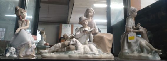 Lladro seated girl on telephone 20cm high, seated shepherds group 30cm wide, and Nao girl with hound