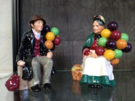 Royal Doulton HN.1315 The Old Balloon Seller, 19.5cm, and HN 1954 The Balloon Man, 18.5cm. (2)