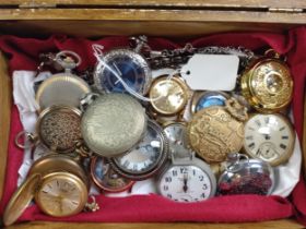 A collection of nineteen miscellaneous watches in a wooden box.