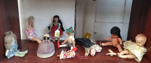 Mattel Barbie doll and eight other small dolls (9)