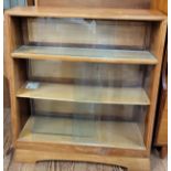 A teak mid-century glass front display cabinet. 105cm x 92cm x 35cm.