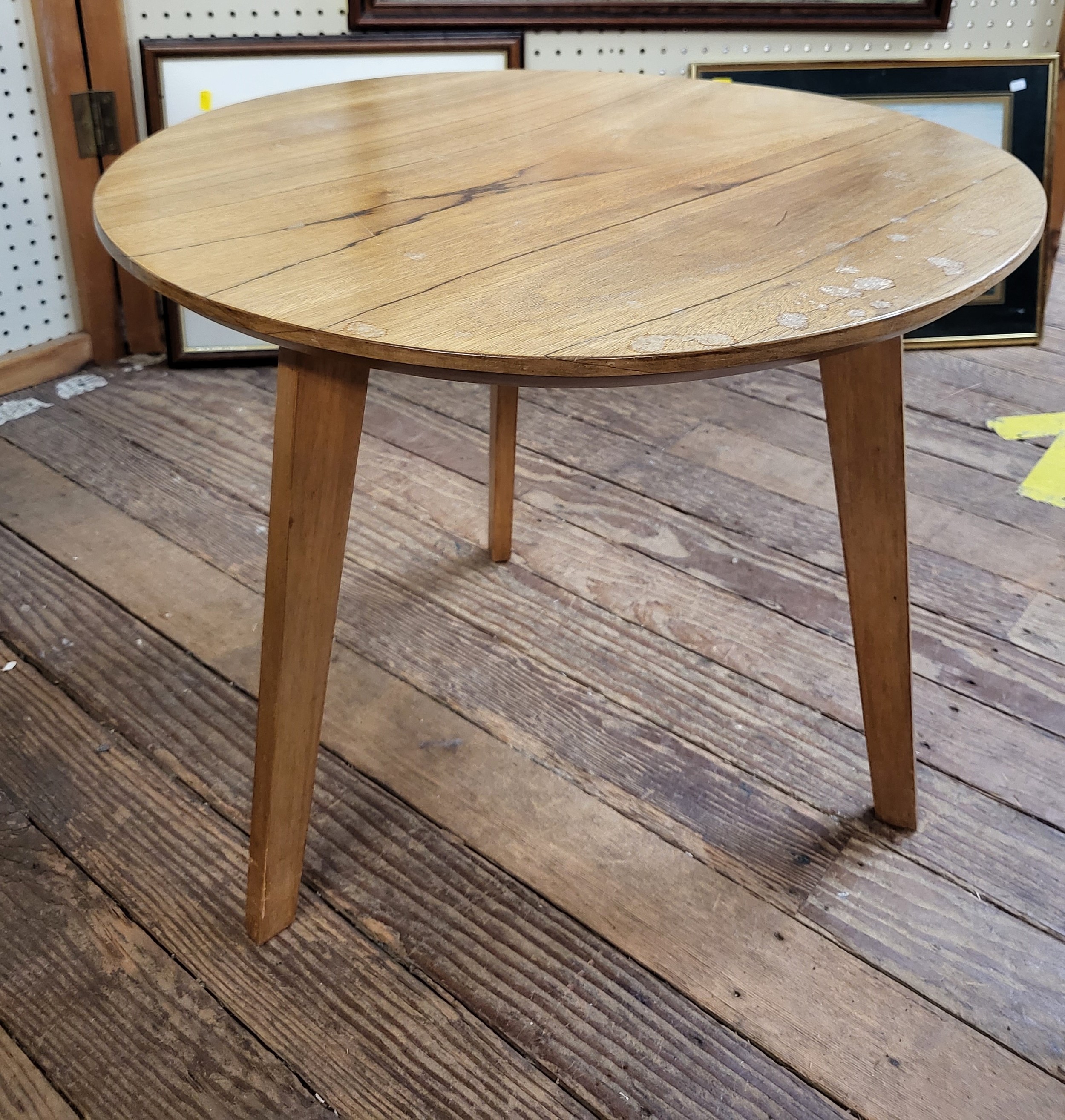 A mid-century circular tripod occasional table. 45cm x 55cm diameter