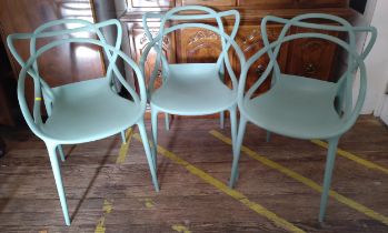 Three stackable Kartel chairs