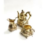 A Fine Mid Victorian Three piece Silver gilt Tea set. Hunt and Roskell and Barnard Brothers.