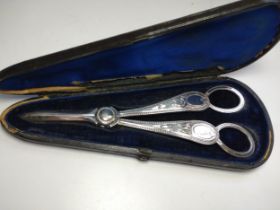 A pair of Victorian Sterling Silver grape scissors. 1866. cased.