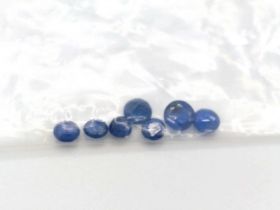 A parcel of seven unmounted round-cut sapphires, 1.13ct.