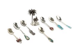 A collection of six silver and enamel Bermuda souvenir spoons, each having enamel floral, island