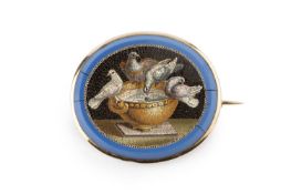 A 19th century micromosaic panel brooch, the oval blue paste panel inlaid with polychrome tesserae