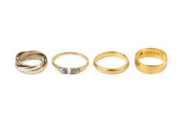 Two 22ct gold wedding bands, together with a 9ct three colour gold Russian wedding band, and a