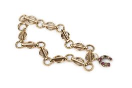 A 9ct gold fancy-link bracelet, hallmarked for Birmingham 1960, maker's mark B&S, suspending a