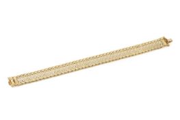 A 9ct gold fancy-link bracelet, length 18.5cmOf modern manufacture and light gauge, with surface