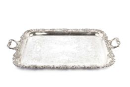 An American silver plated twin handled tea tray, with foliate engraved decoration and vine cast