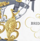 A 'Brides de Gala' silk scarf by Hermès, designed by Hugo Grygkar, of equestrian design, in shades