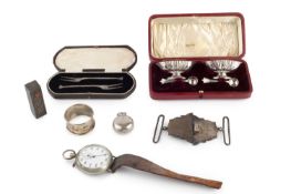 A pair of Edwardian silver boat shaped pedestal salts, with spoons, by Horace Woodward & Co. Ltd,