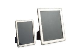 A modern silver large photograph frame, with reeded border and wooden easel backing, by Carr's