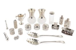 A pair of George III silver old English pattern table spoons, later embossed as berry spoons by