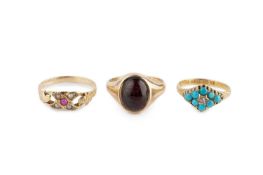 Three dress rings, comprising a flowerhead cluster ring, set with a lasque-cut diamond bordered by