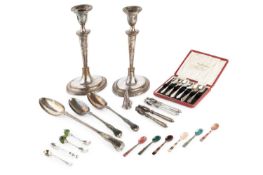 A pair of 19th century silver plated candlesticks, of oval section with tapered stems, 28cm high,