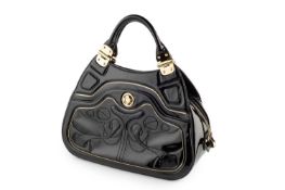 A black patent handbag by Alexander McQueen, with dust bag, and a black patent shoulder bag by Jimmy