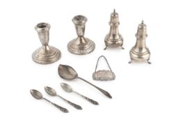A pair of American silver baluster peppers, stamped sterling, 12.5cm high, a pair of American silver