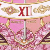 A 'Gloria Soli' silk scarf by Hermès, designed by Joachim Metz, depicting a sunburst with Roman