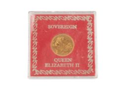 An Elizabeth II sovereign, dated 1981, cased