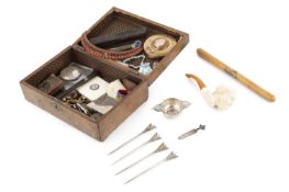 A silver twin handled miniature porringer, London 1929, 9cm wide overall, a silver bookmark, four