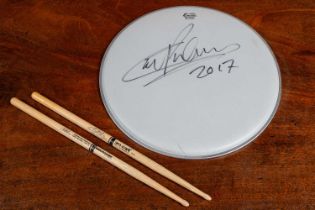 Carl Palmer drum head and sticks
