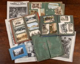 A collection of postcard albums and Suffragette ephemera