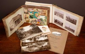 Three photo albums and a book