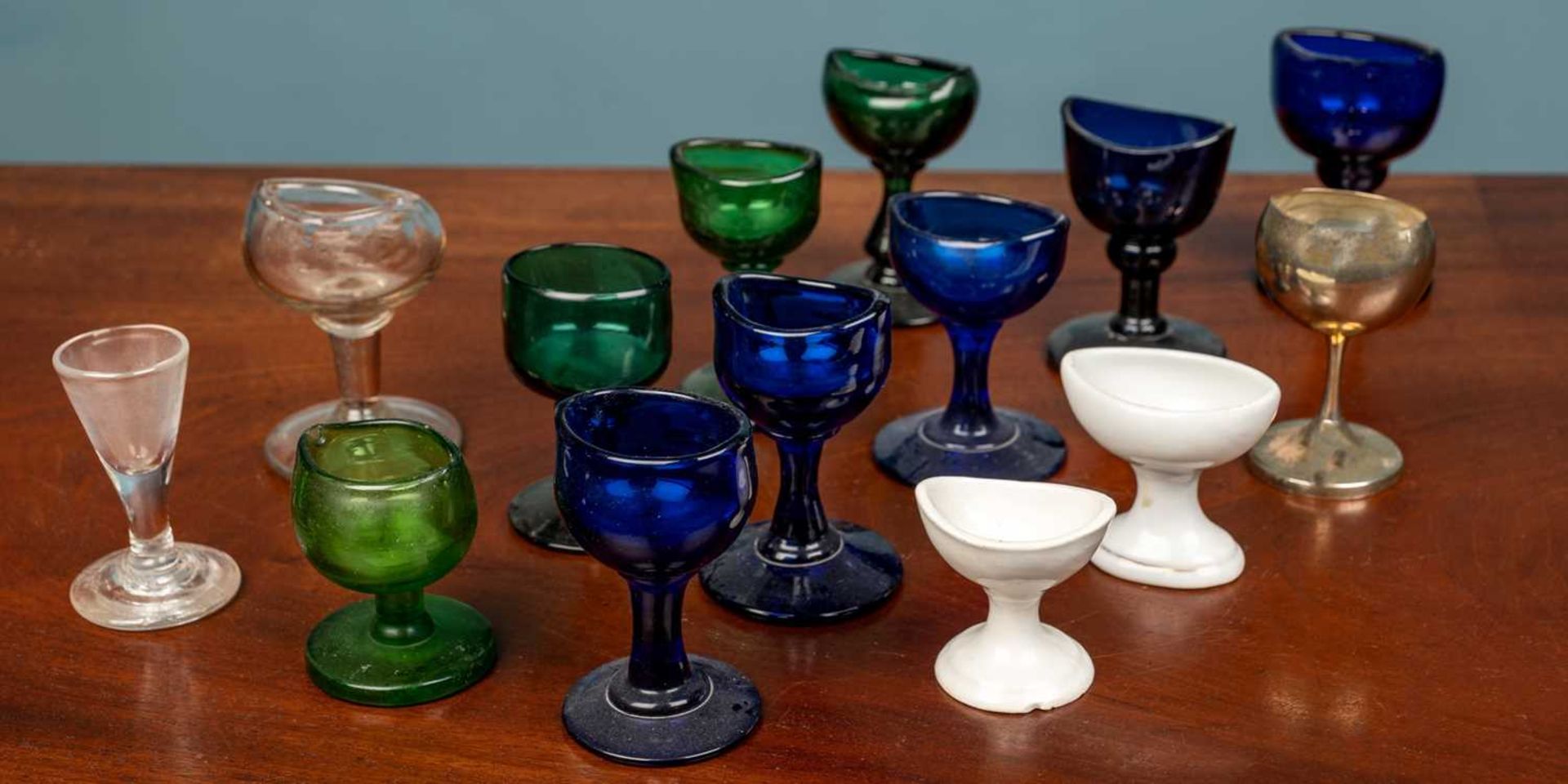 A collection of 18th and 19th century glass eye baths