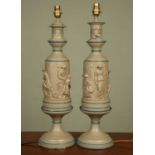 A pair of Greek style lamp stands