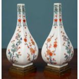 A pair of French porcelain bottle vases