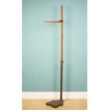 An Edwardian cast iron, brass and boxwood bathroom height measurer