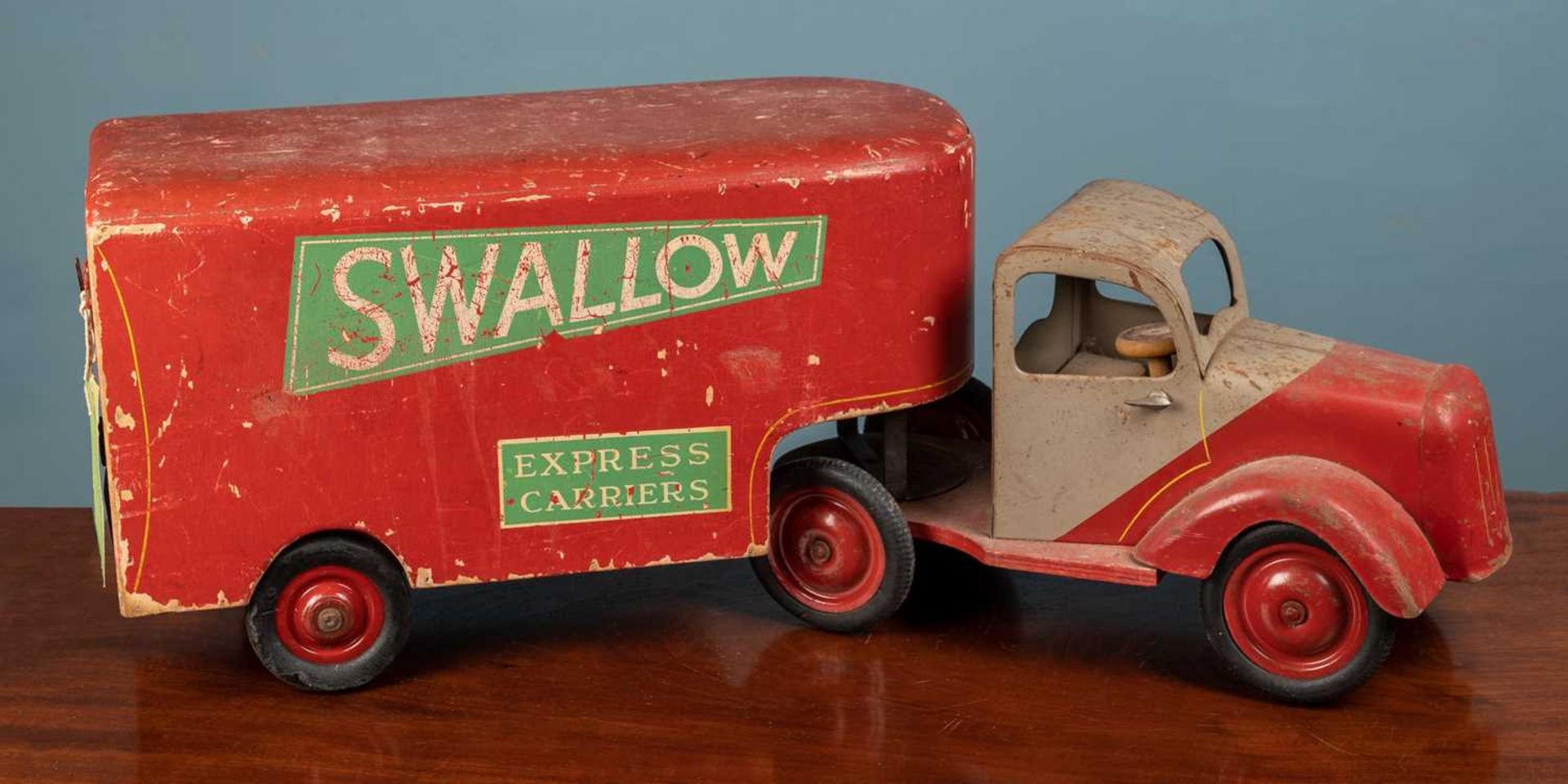 A mid-20th century painted wood and tin toy lorry - Image 2 of 3