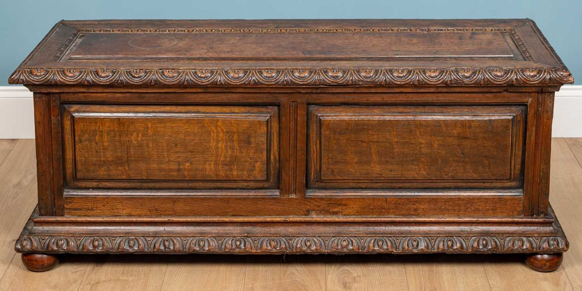 A 17th century oak Italian style cassone or chest