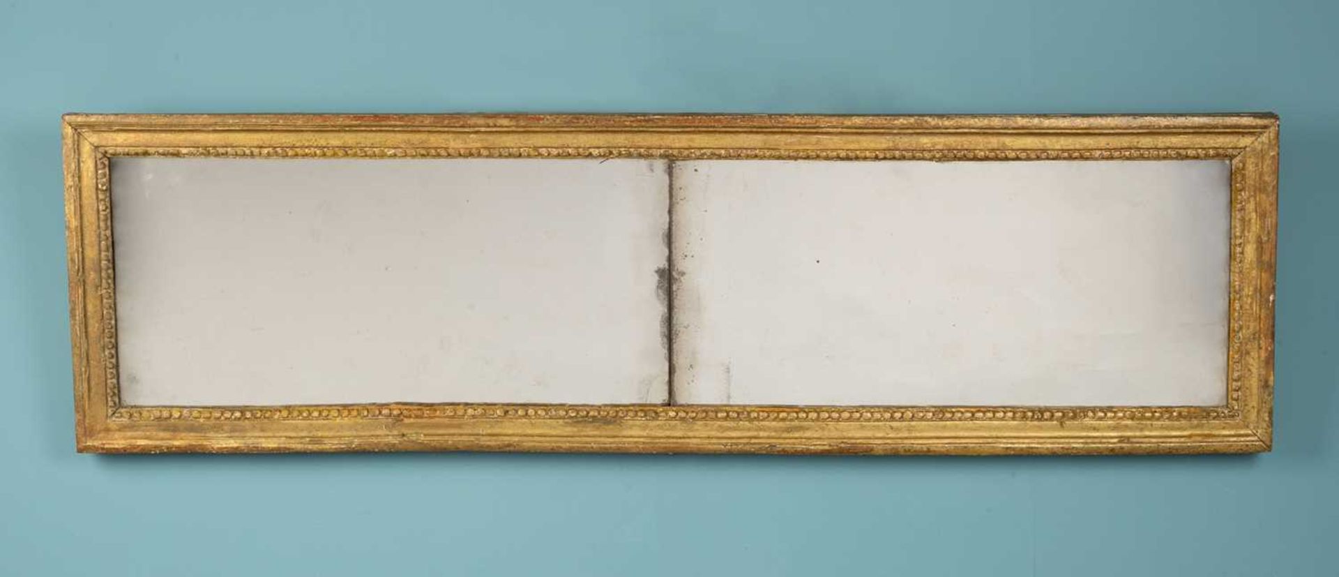 A 19th Century French gilt framed ovemantle mirror